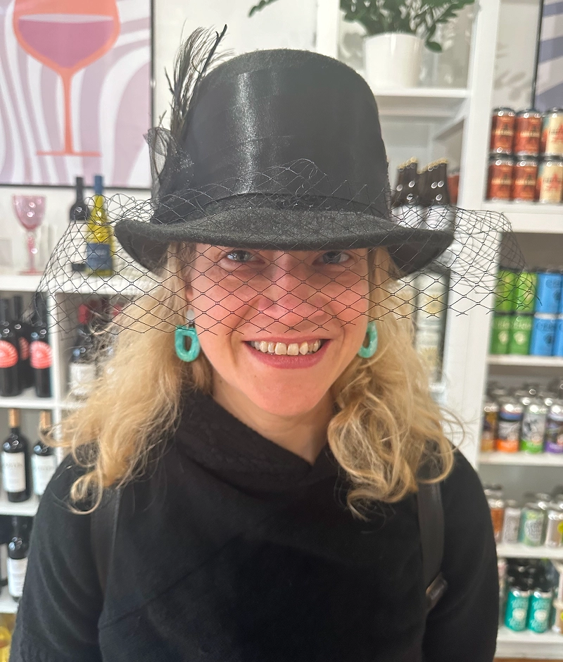 Stylish hat and veil, cheerful expression