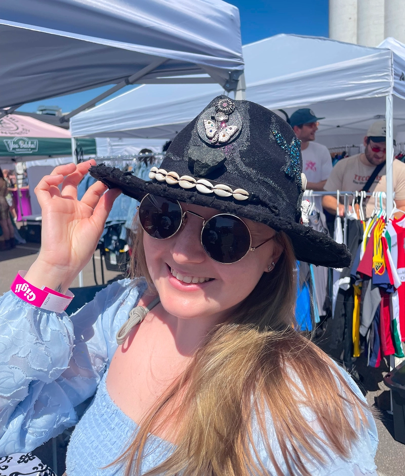 Woman in hat at outdoor market